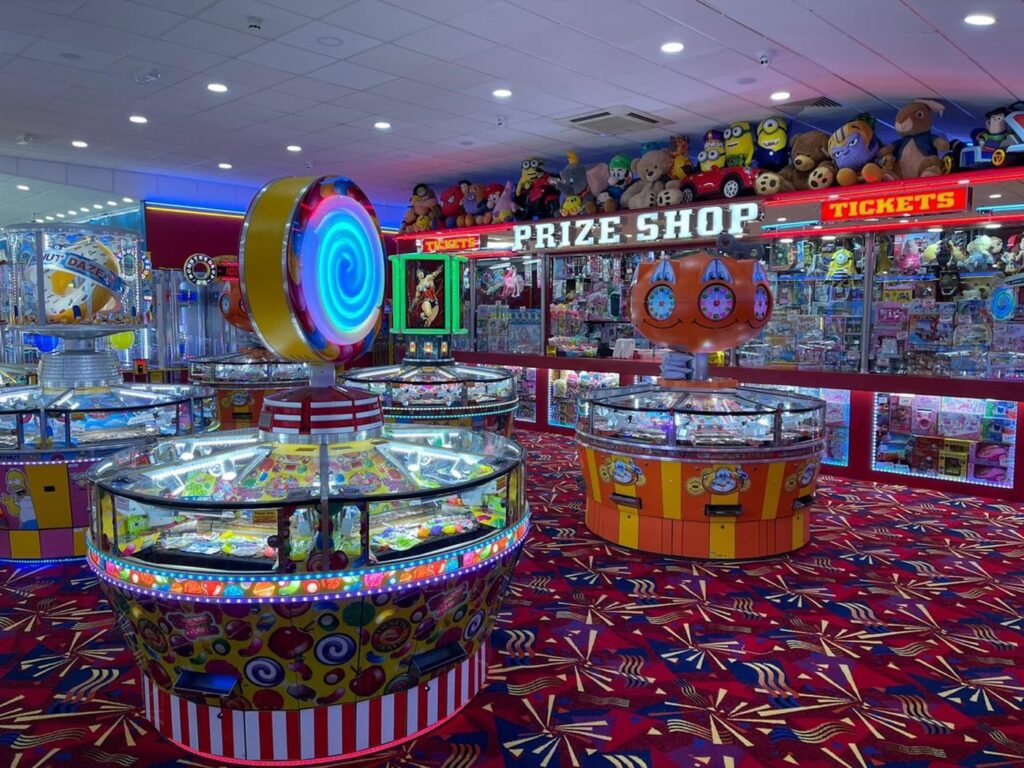 The Prize Shop at Hunstanton Pier, with shelves of toys and soft prizes